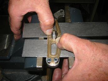  Using two parallels to seat the pin flush in the back of the trunion.